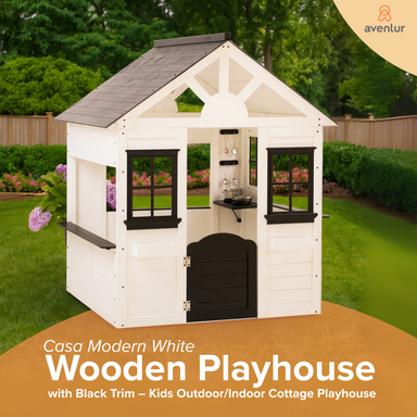 White wooden playhouse with black trim in a garden setting, featuring the brand 'Avenlur'.