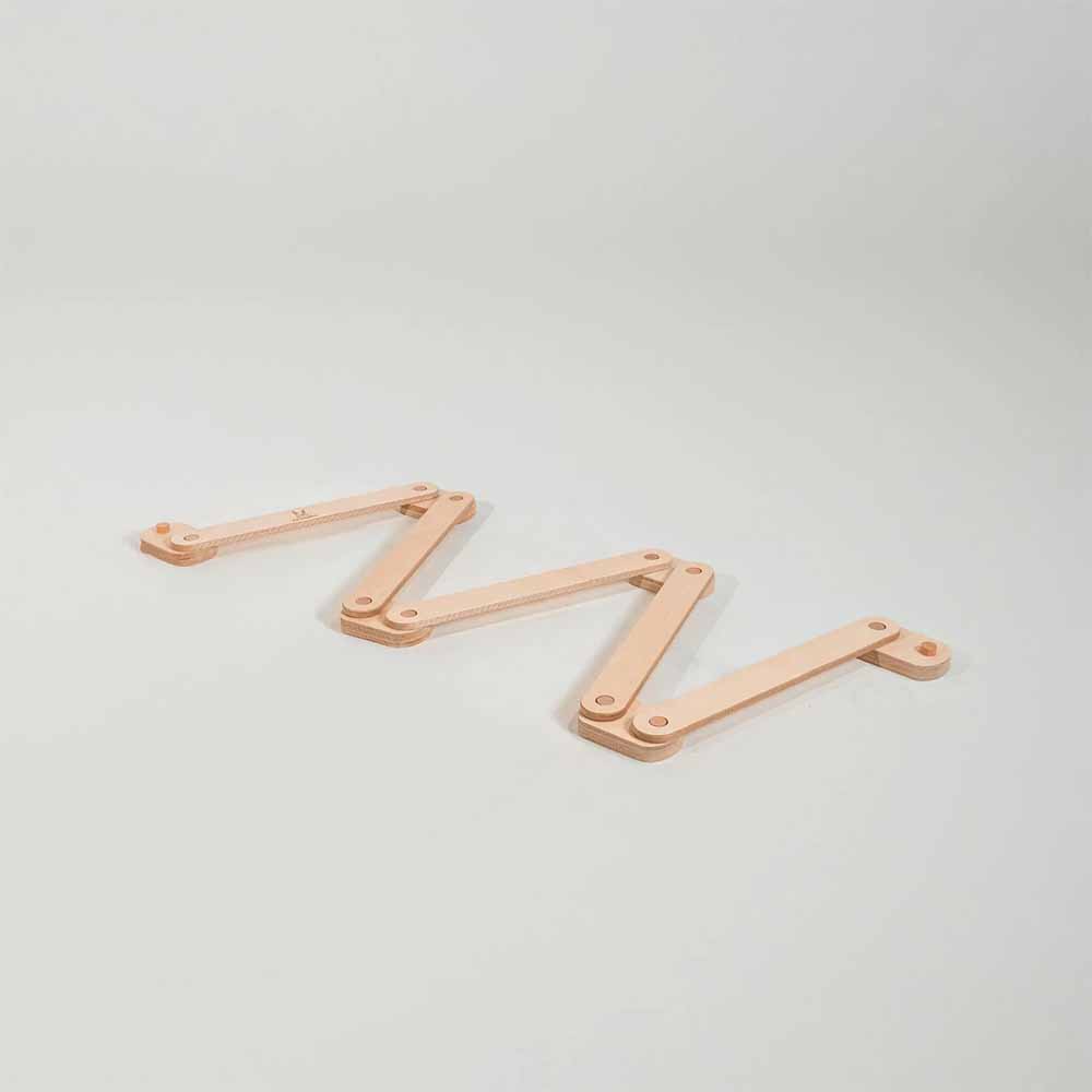 Maple wooden balance beam on a light gray background