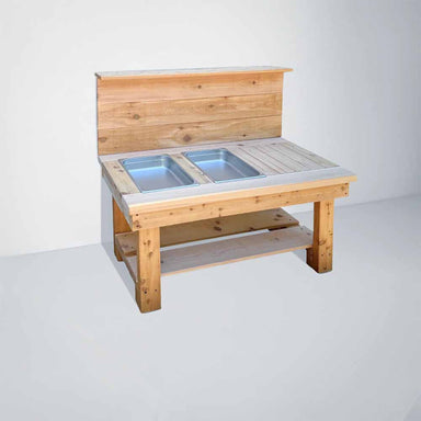 Wooden outdoor kitchen with concrete countertop and metal sinks on a white background