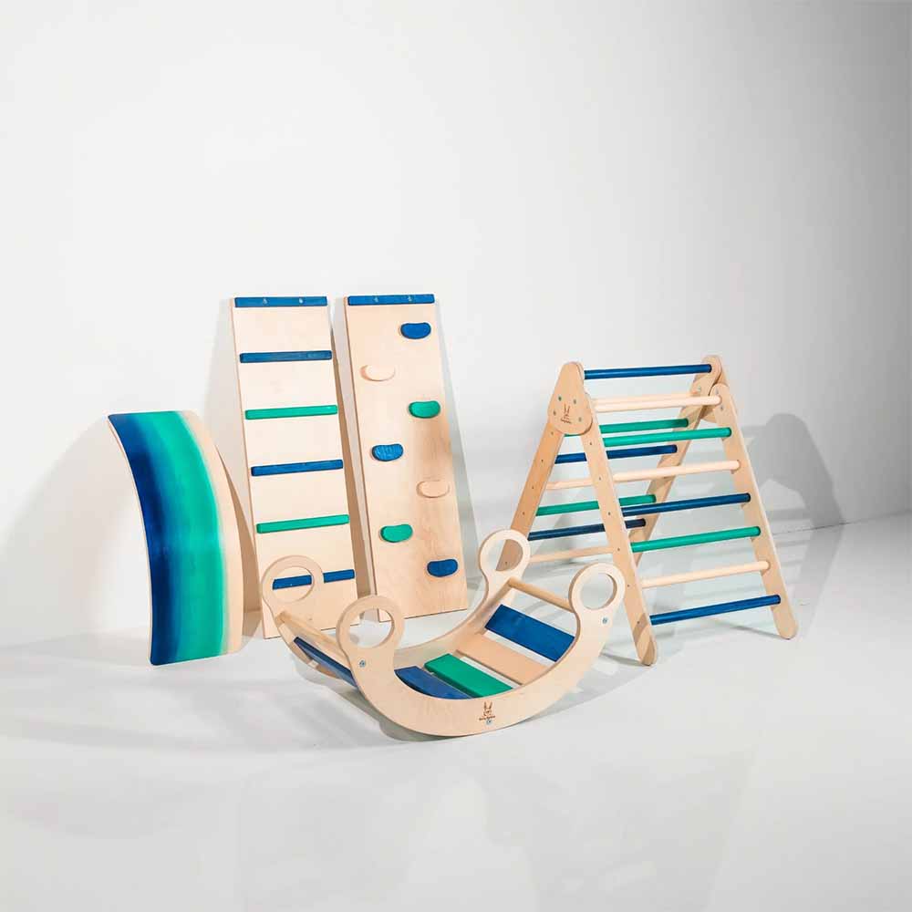 Wooden climbing toy set with blue and green accents on a white background