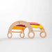 Wooden toy with colorful arches on a white background