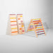 Two wooden climbing toys with colorful steps and a colorful wooden climbing triangle on a white background