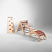 Wooden children's slide and ladder on a gray background