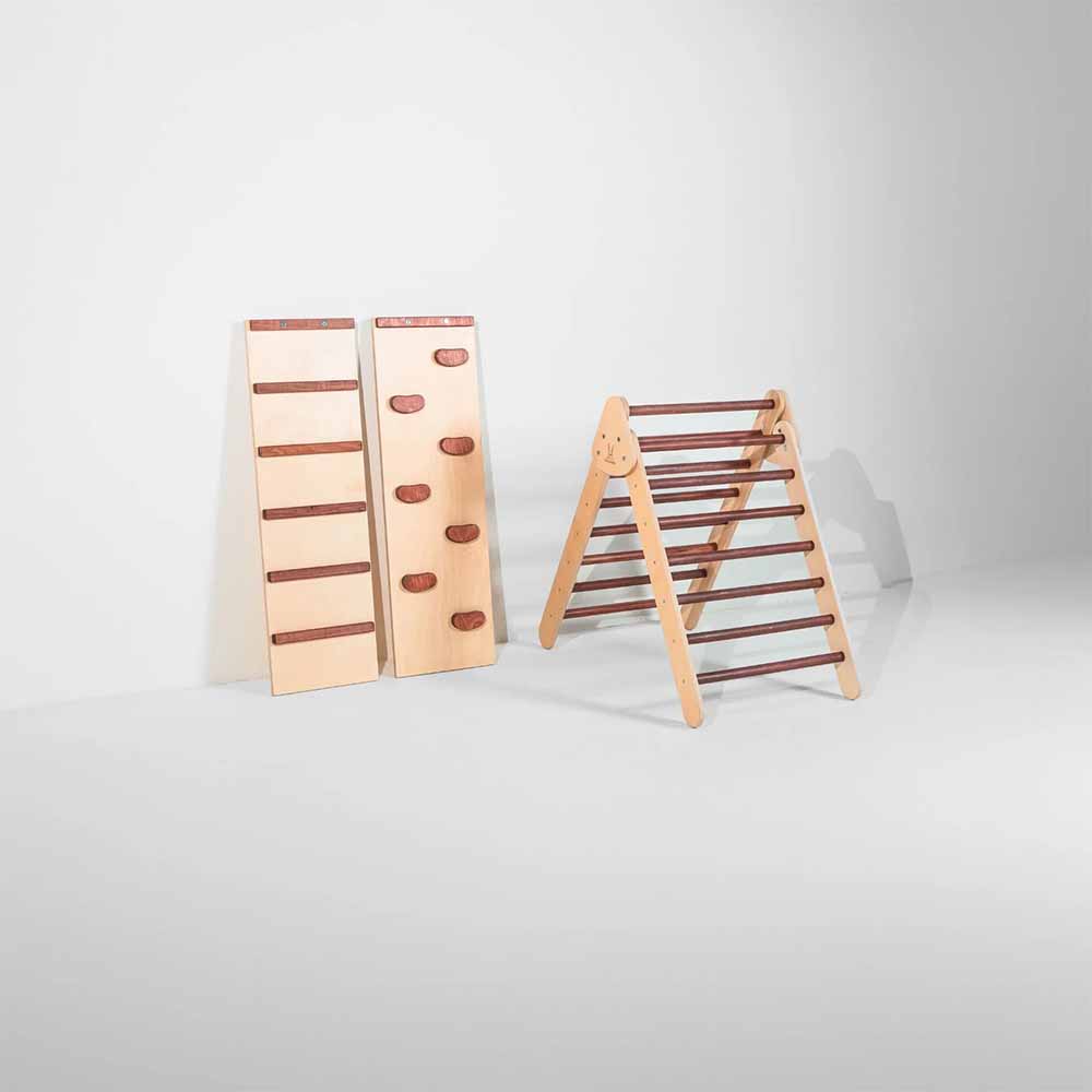 Wooden climbing toy set on a white background