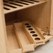 Wooden drawer with compartments and a tray inside