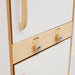 Close-up of a wooden refrigerator door with control knobs on a white background