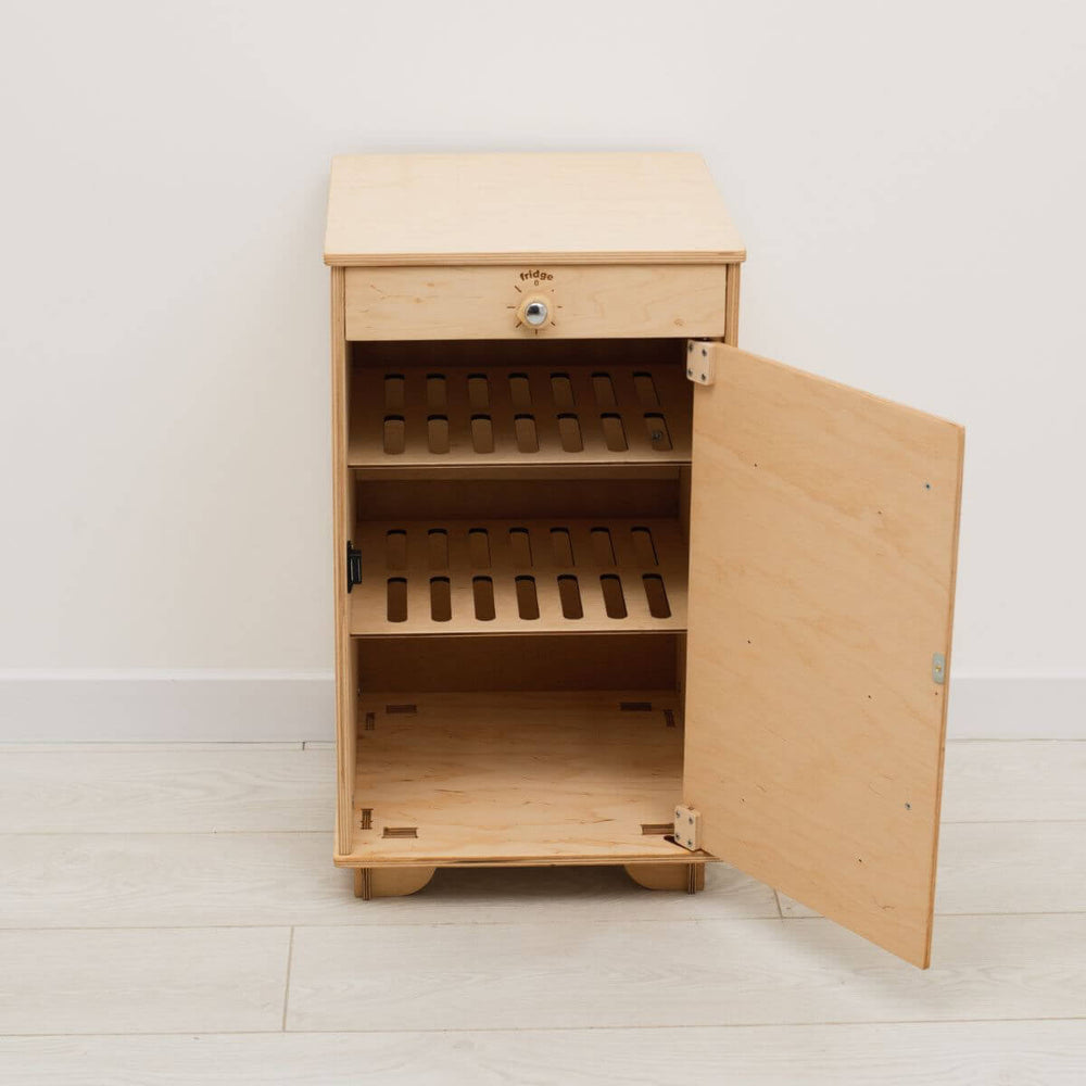 Wooden cabinet with open door on a white background