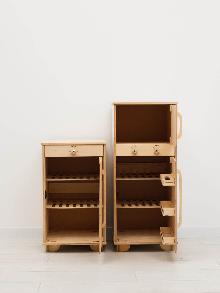 Two wooden refrigerators with shelves on a white background