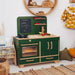 Children's toy kitchen set with green and wooden design in a room setting.
