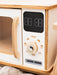 Close up of wooden white microwave play appliance knobs, settings, and pretend display
