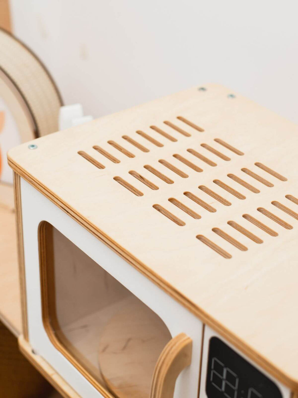 Close Up of top vent for a wooden toy microwave