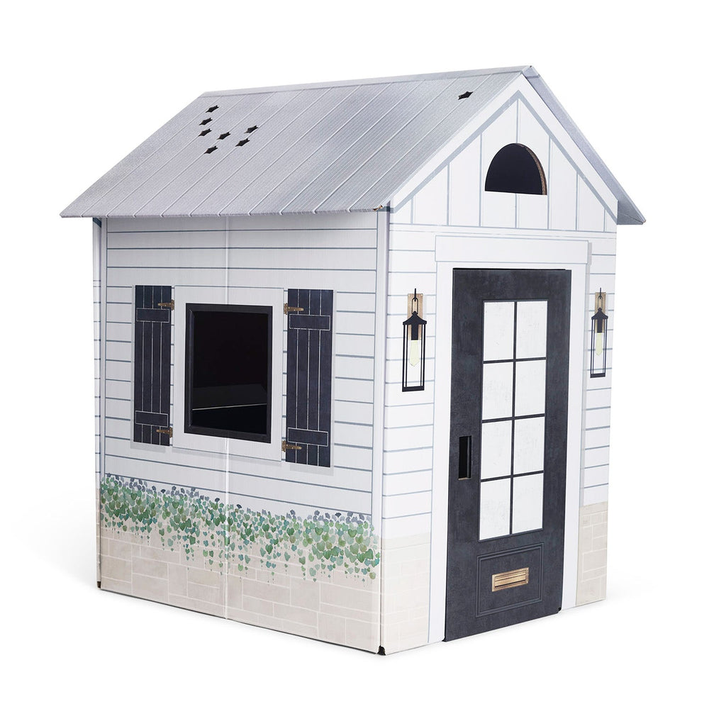 Playhouse with white walls, gray roof, and black door on a white background