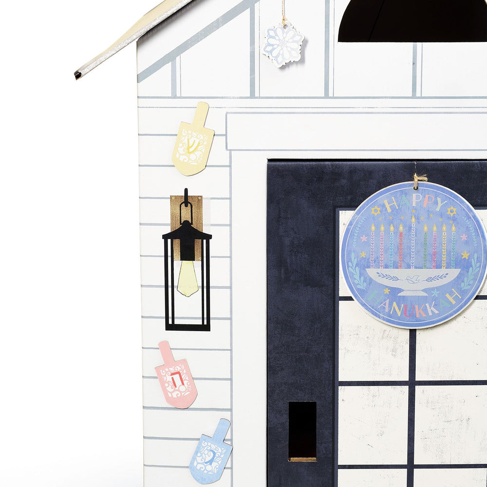 Decorative door hanger with Hanukkah theme on a door with window