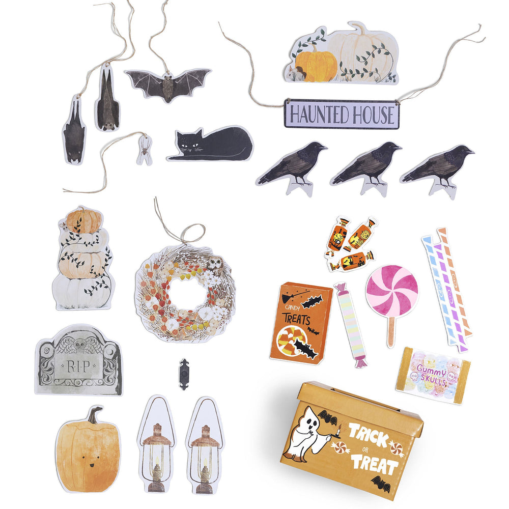 Collection of Halloween-themed decorations and items on a white background
