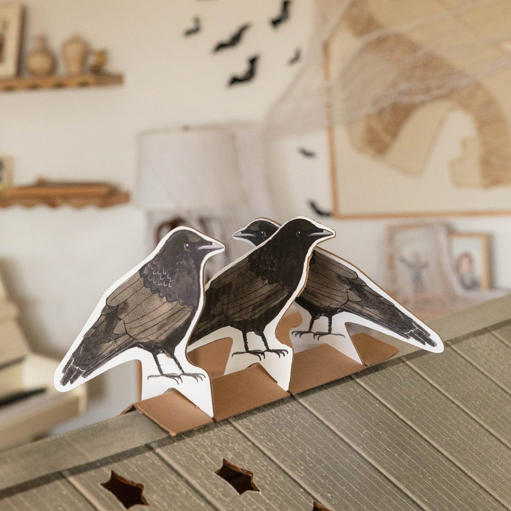 Cutout ravens on a play house roof.