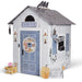 Halloween-themed playhouse with decorative elements on a white background