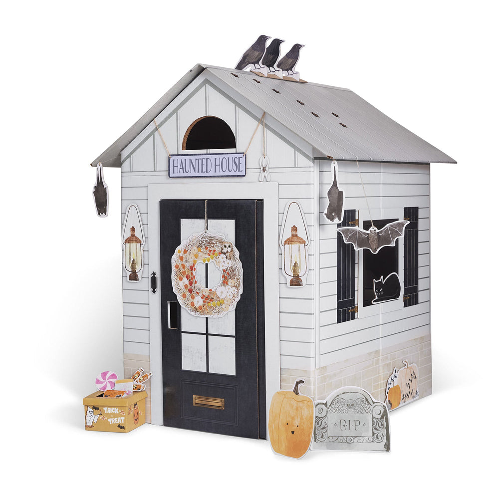 Halloween-themed playhouse with decorative elements on a white background