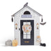 Halloween-themed play house with decorative elements on a white background