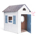 Children's playhouse with open door on a white background