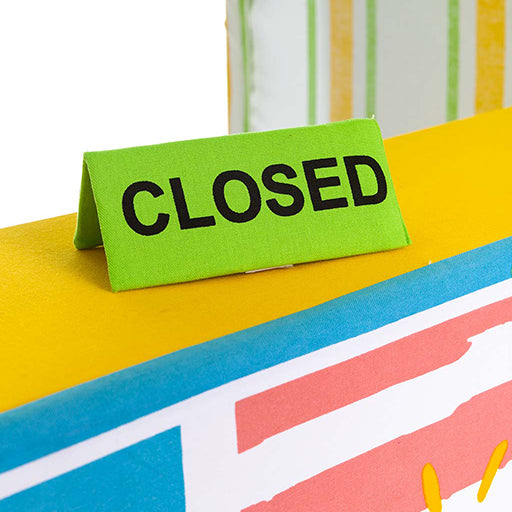 Green 'CLOSED' sign on a play tent