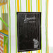 Black menu with 'Lemonade Daily Specials' text against a striped background