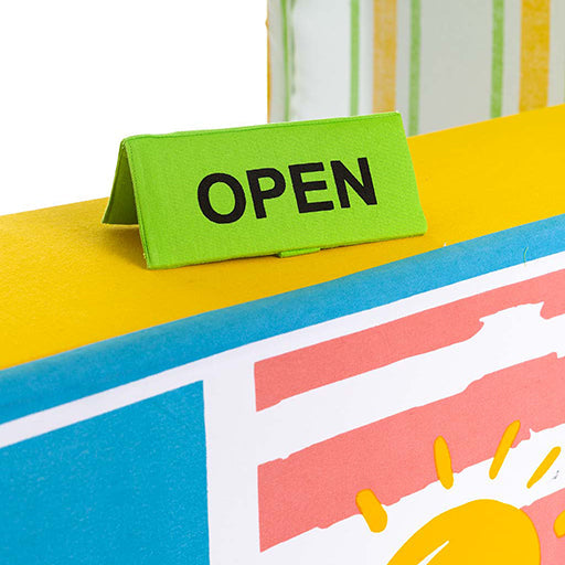 Colorful sign with 'OPEN' on a play tent