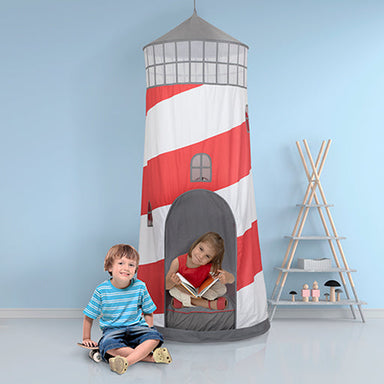 Children playing inside a lighthouse-shaped play tent with a blue wall background.