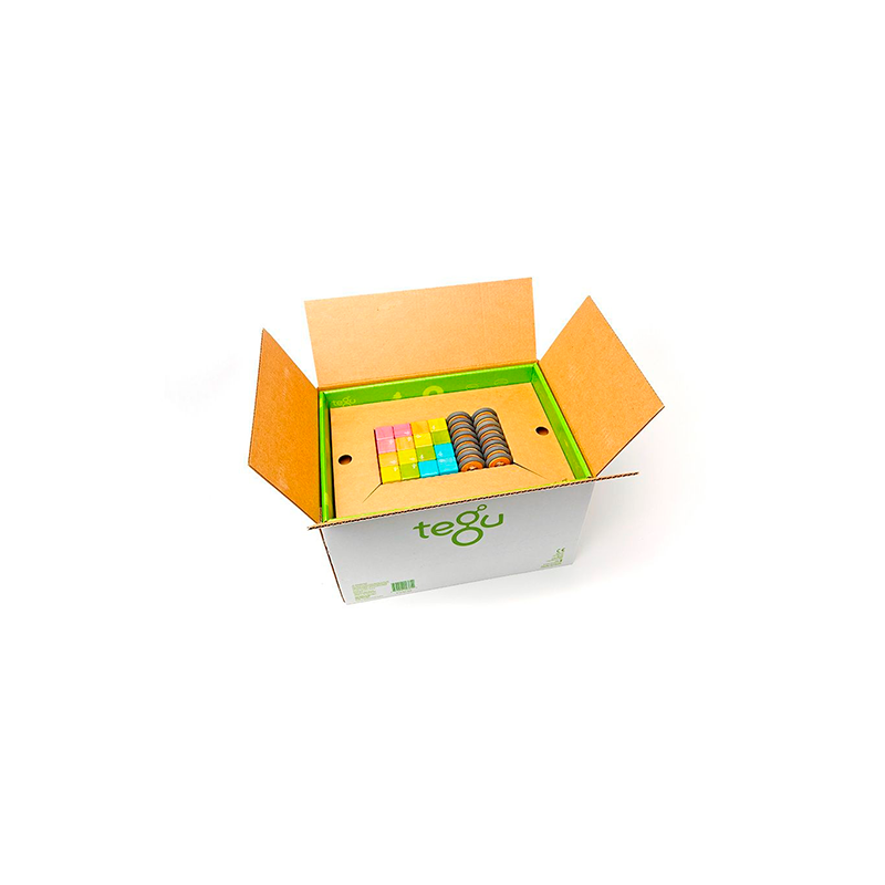 Open cardboard box with colorful magnetic blocks on a white background