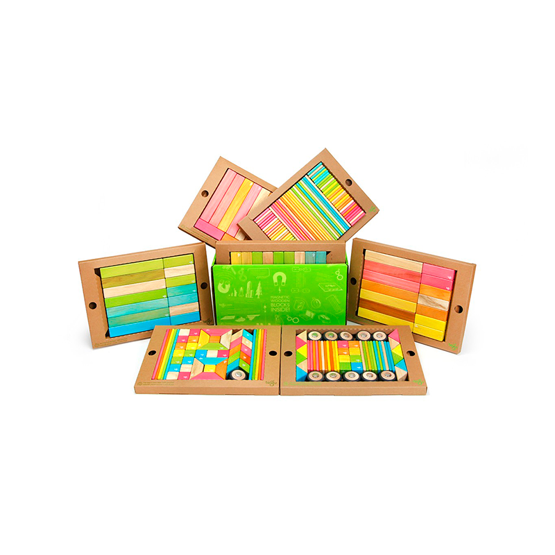 Set of colorful wooden blocks in a wooden box on a white background