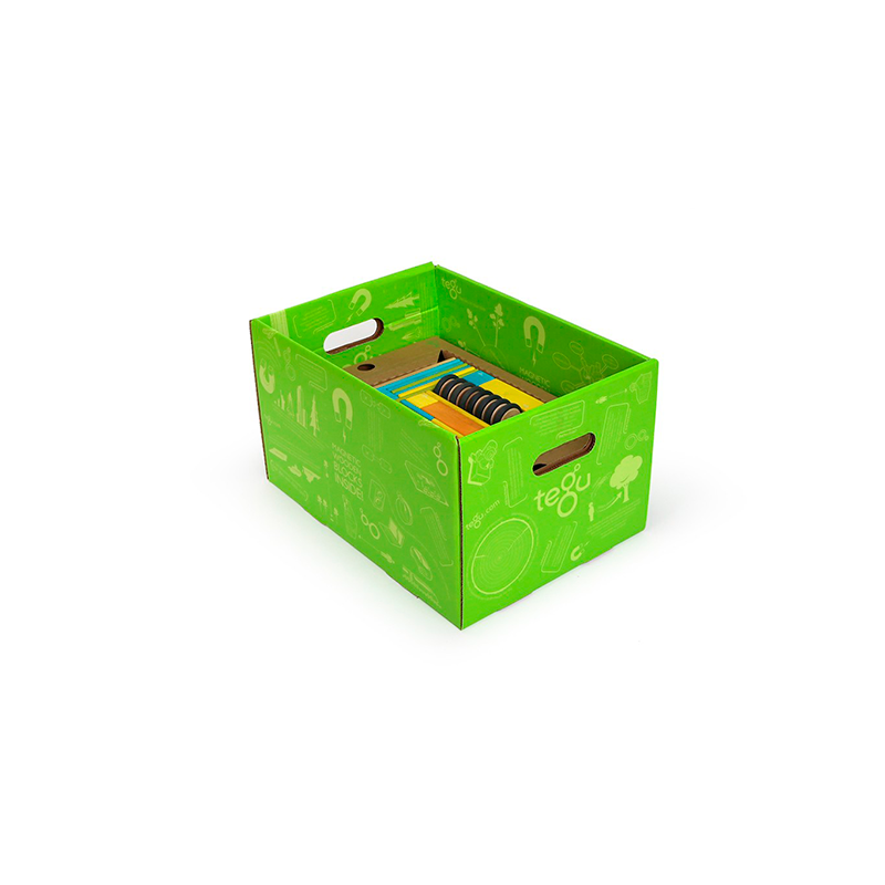 Green storage box with colorful blocks on a white background
