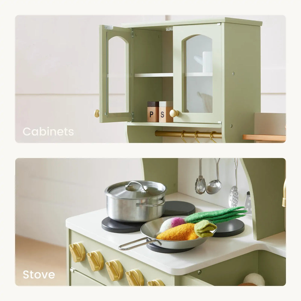 Toy kitchen setup with cabinets and stove, featuring kitchenware and ingredients.