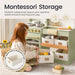 Montessori toy kitchen set with storage boxes and a child playing with it.