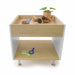 Wooden activity table with toys and items on a white background