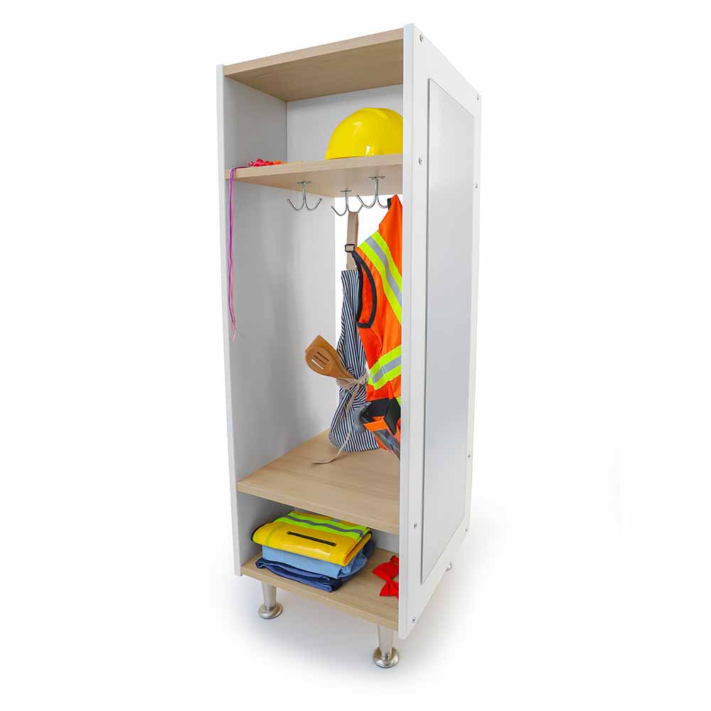 White dress-up wardrobe with wooden shelves and hooks, containing safety gear on a white background
