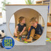 Two children playing with toys inside a play cube, with 'Design Best 2024 Journal' badge on the left.