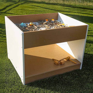 Wooden big and wide table on grass