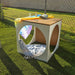 Outdoor play cube on grass