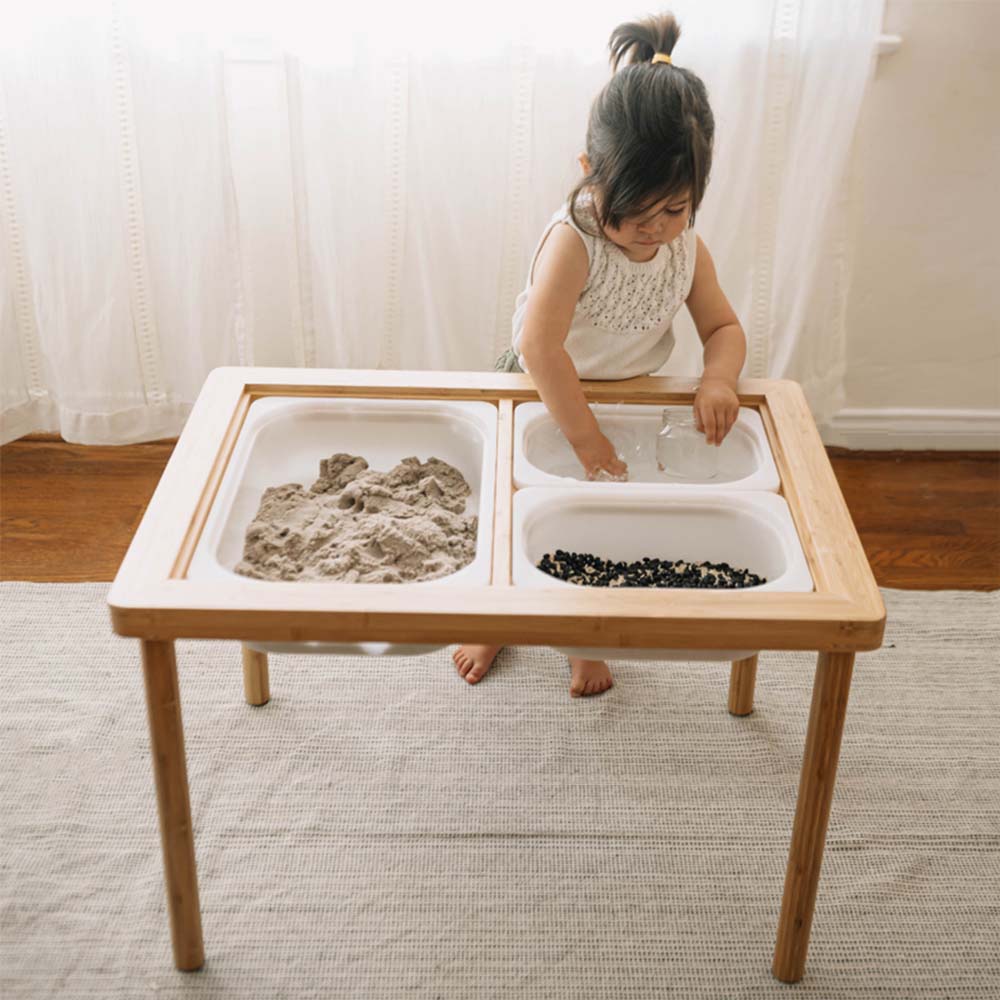 Wonder and Wise Land Sand and Water Table Child Playing with Sensory Bins